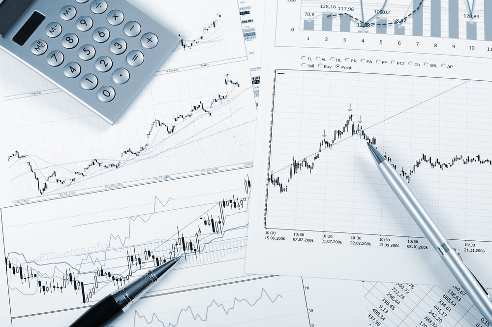 charts and graphs of sales of securities - workplace successful business man charts and graphs of sales of securities - workplace successful business man